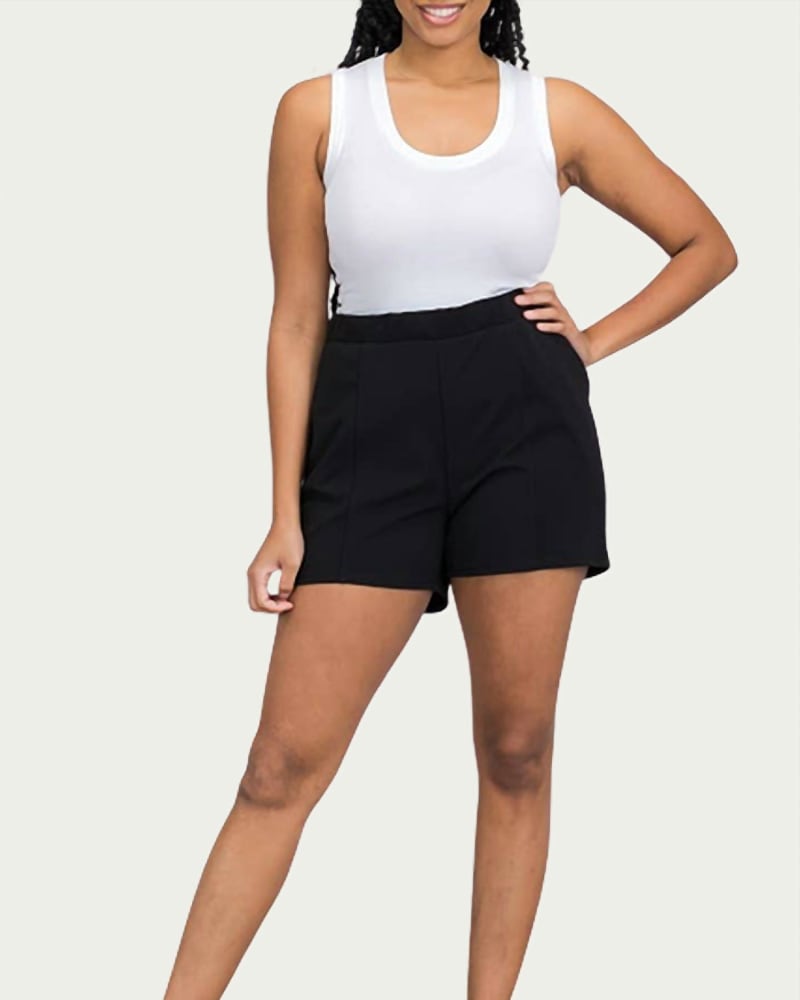 Front of a model wearing a size 1X Seamed Scuba Stretch-Crepe Shorts In Black in Black by BLUE LEOPARD. | dia_product_style_image_id:347665